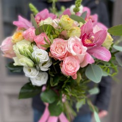 A bouquet of different flowers in soft tones