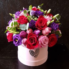 Flower box with tulips and roses